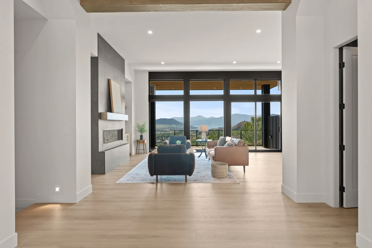 Foyer opening into the great room and valley views